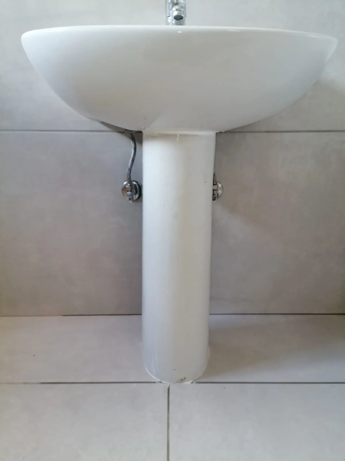 Completed pedestal basin installation