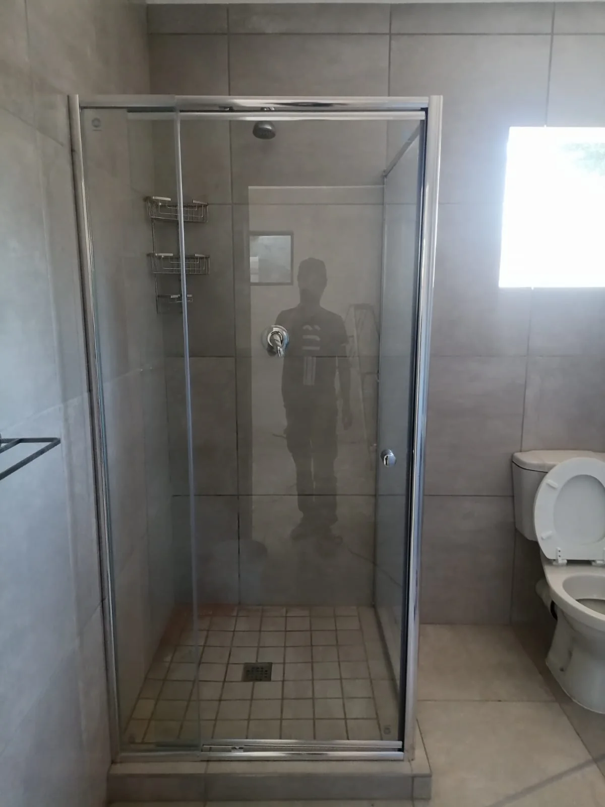Completed shower enclosure and plumbing